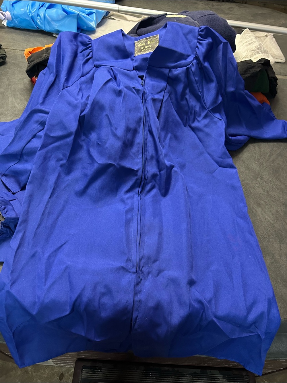 Oak Hall Graduation Gown (5’ to 5’2”) and Cap (One size fits all)